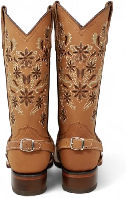 Pair of brown cowboy boots with floral embroidery on a white background