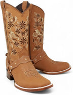 Tan cowboy boots with intricate floral embroidery on a white background
