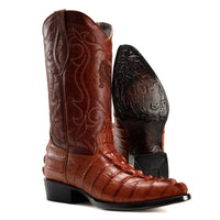 Durable heel and sole design on men’s caiman print cowboy boots
