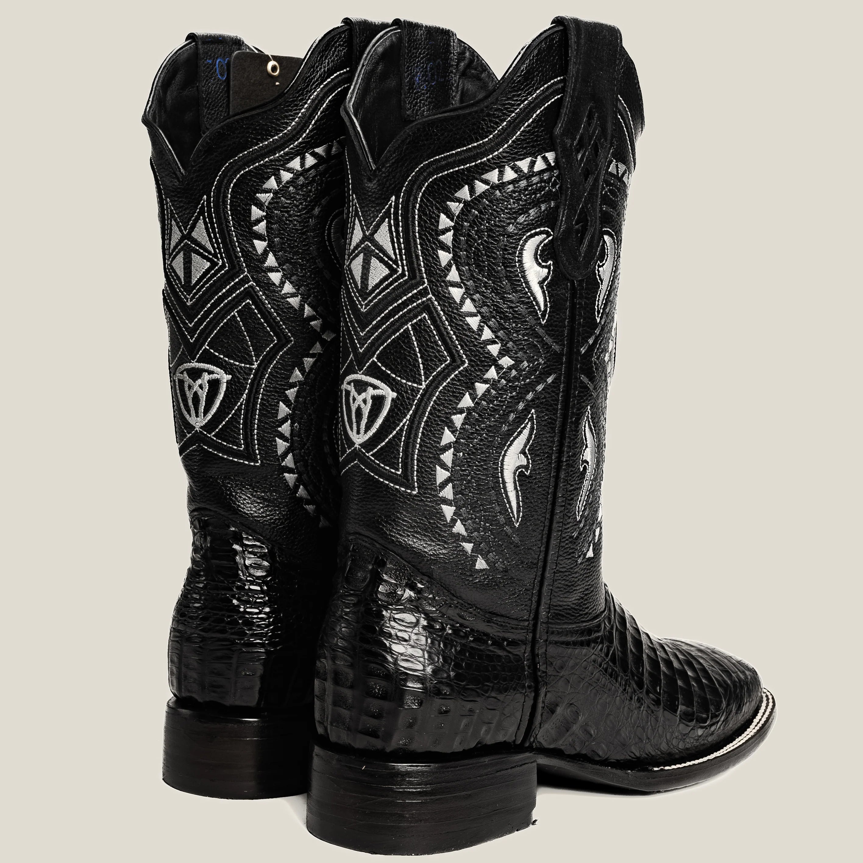 Rear view of men’s alligator caiman cowboy boots with pull tabs