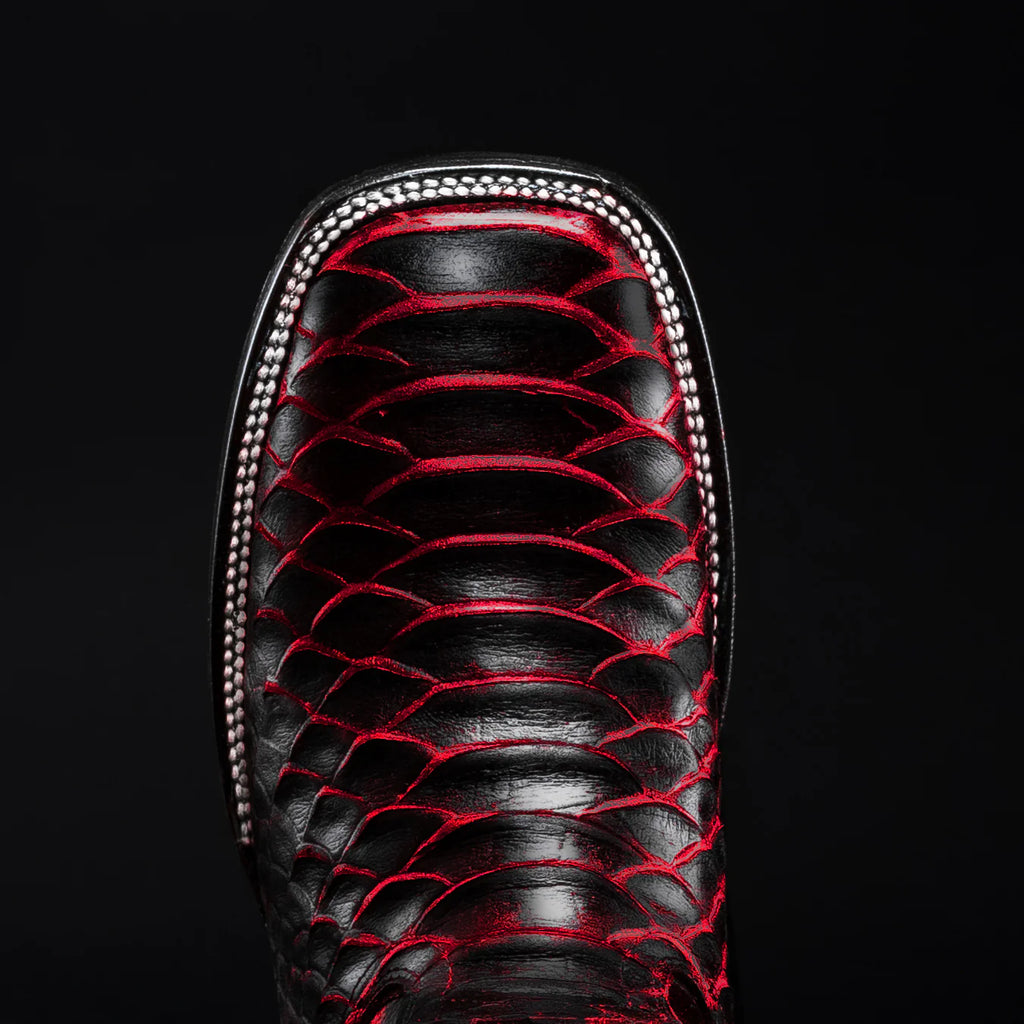 Square toe construction on men’s python snakeskin cowboy boots