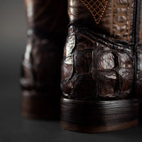Stitched shaft detail on men’s brown pirarucu cowboy boots