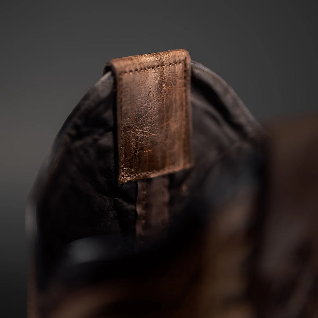 Stitched shaft detail on men’s brown pirarucu cowboy boots