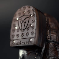 Durable heel on men’s brown pirarucu square toe cowboy boots
