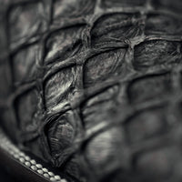 Close-up of a textured black surface with intricate patterns