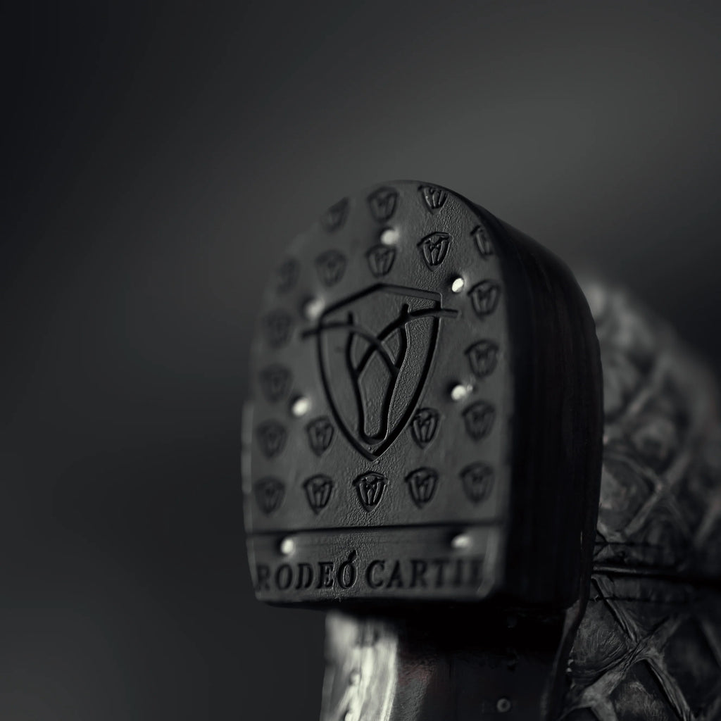 Durable heel on men’s black pirarucu square toe cowboy boots